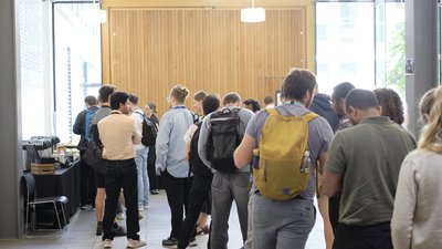 Attendees during lunch at TartanQEC 2026, Informatics Forum, University of Edinburgh