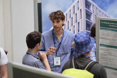 At the poster session and drinks reception during TartanQEC 2026, Informatics Forum, University of Edinburgh