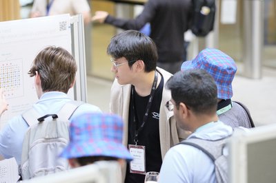 At the poster session and drinks reception during TartanQEC 2026, Informatics Forum, University of Edinburgh