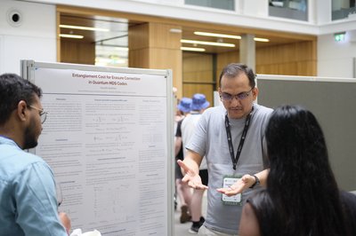 At the poster session and drinks reception during TartanQEC 2026, Informatics Forum, University of Edinburgh