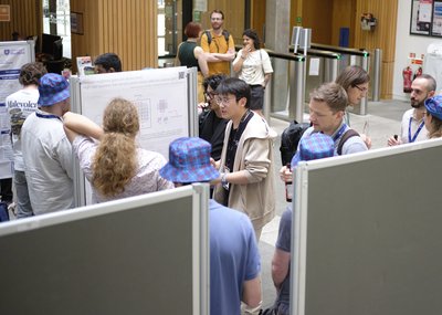 At the poster session and drinks reception during TartanQEC 2026, Informatics Forum, University of Edinburgh